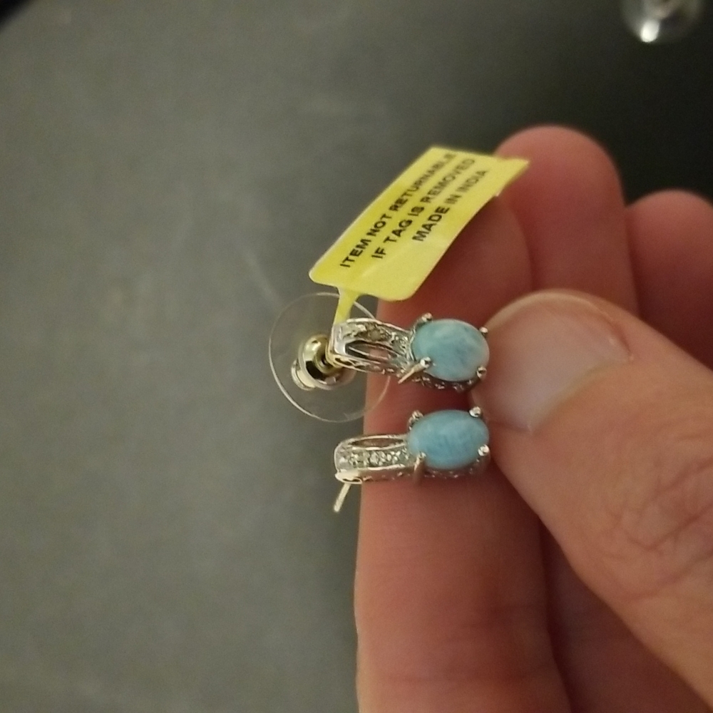 Sterling silver earrings with pale blue stones